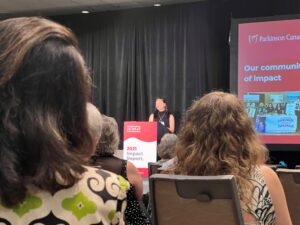 Woman standing at podium
