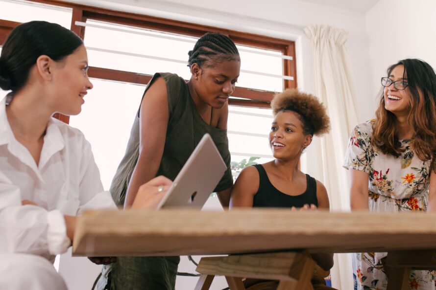 Women sitting at a table and talking
